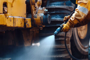 A mining truck being washed with AxxaVis HST-10 to remove chloride contamination.